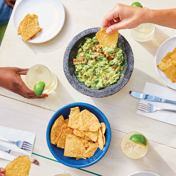 chips, guacamole, and Teremana Tequila drinks on table